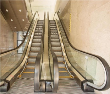 COMMERCIAL ESCALATORS/MOVING WALKWAYS